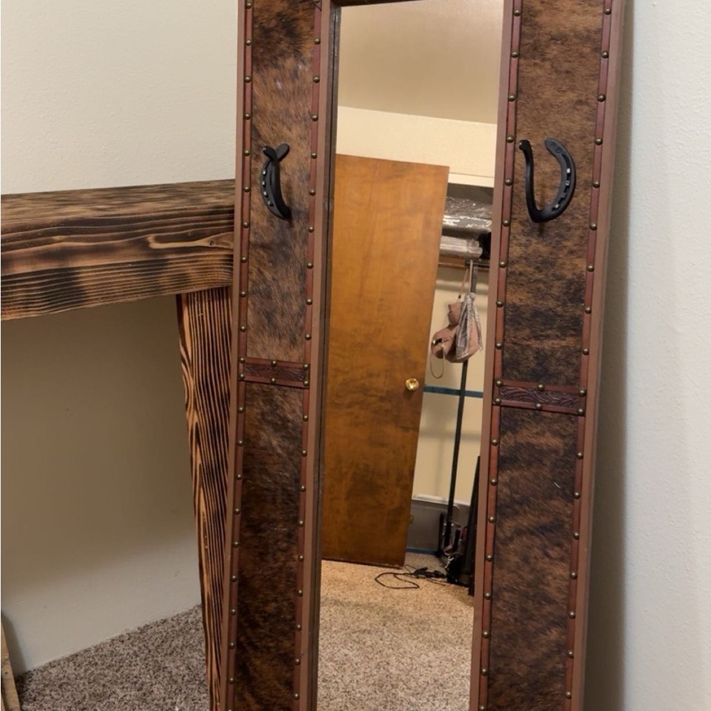 Rustic Cowhide Mirror with Horseshoe Accents